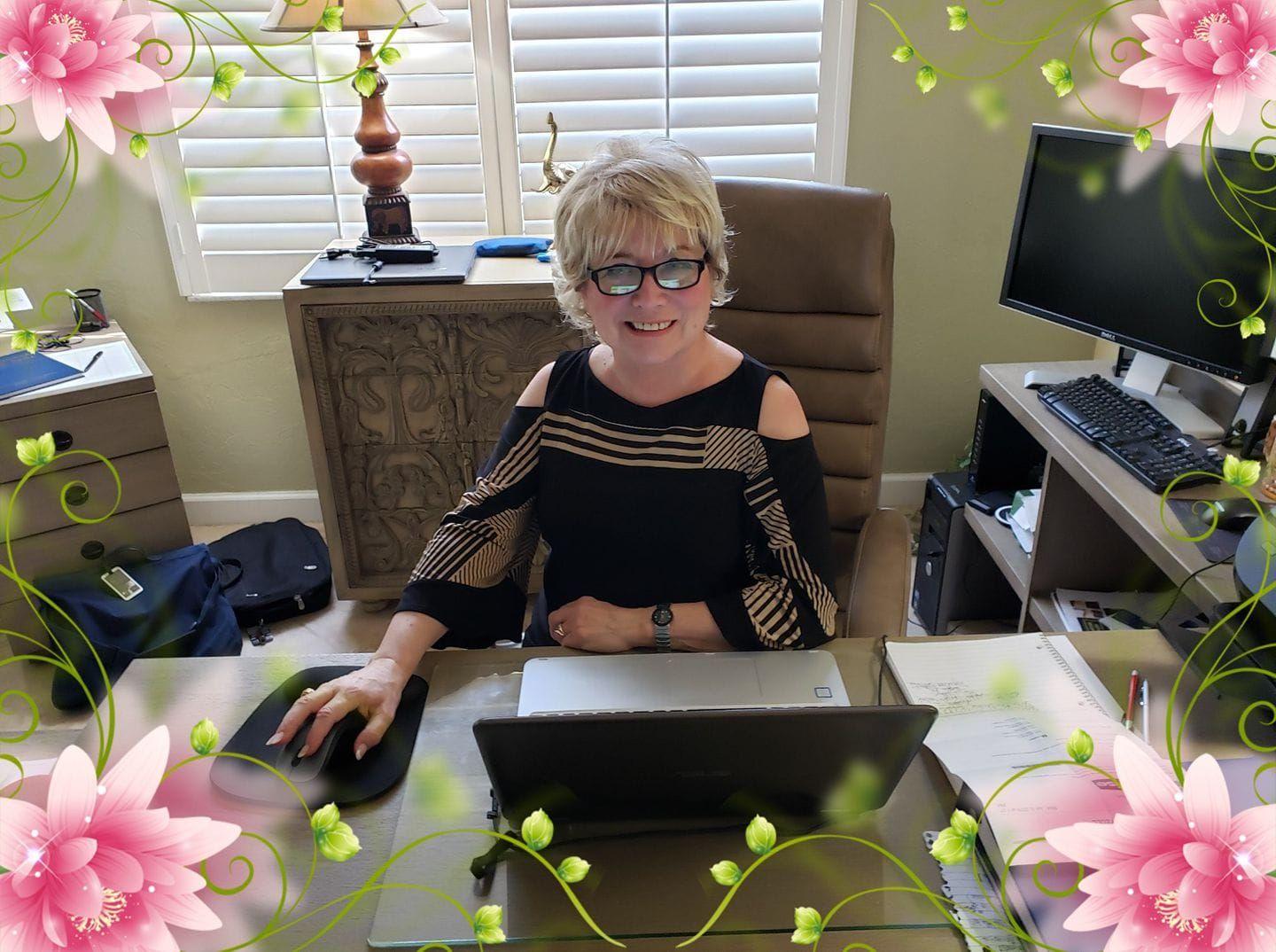 Person sitting at a desk with a laptop, surrounded by office furniture and floral border decorations.